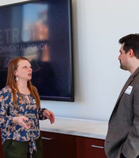 Samantha Pickering talks to someone during a 2024 Detroit policy soiree.