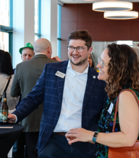 Trent Wolf smiles during a 2024 Detroit policy soiree.