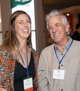 Marie McCormick and James Clift laugh at the 2023 annual event