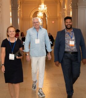 Selma Tucker walks into the 2023 annual event with fellow guests