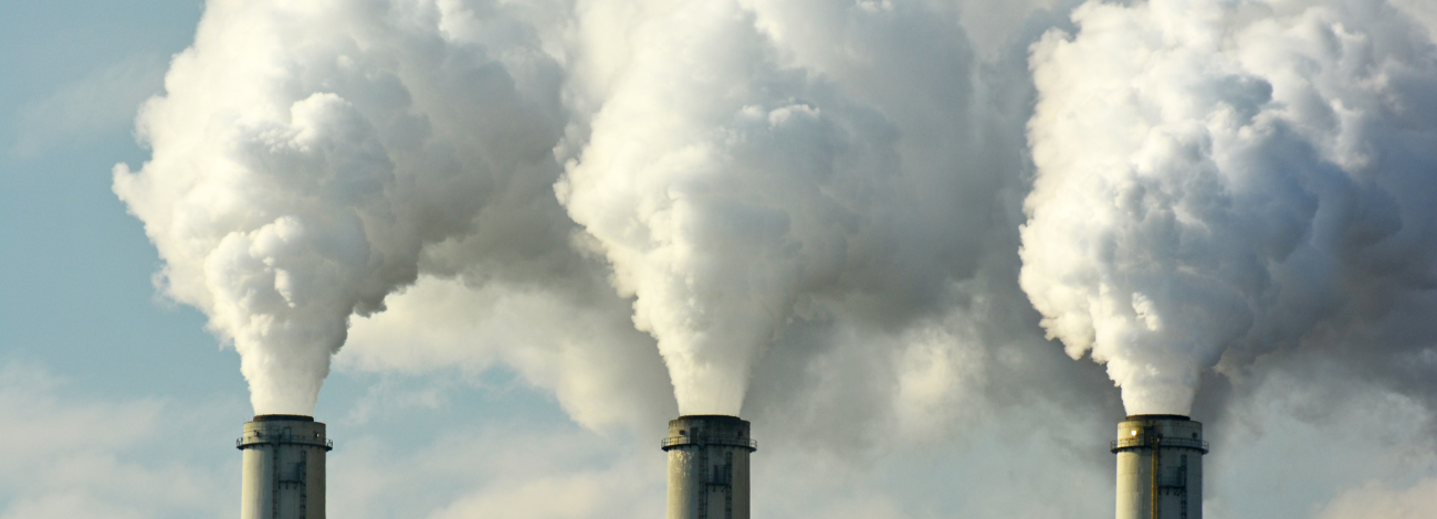 Smokestacks send smoke into the air