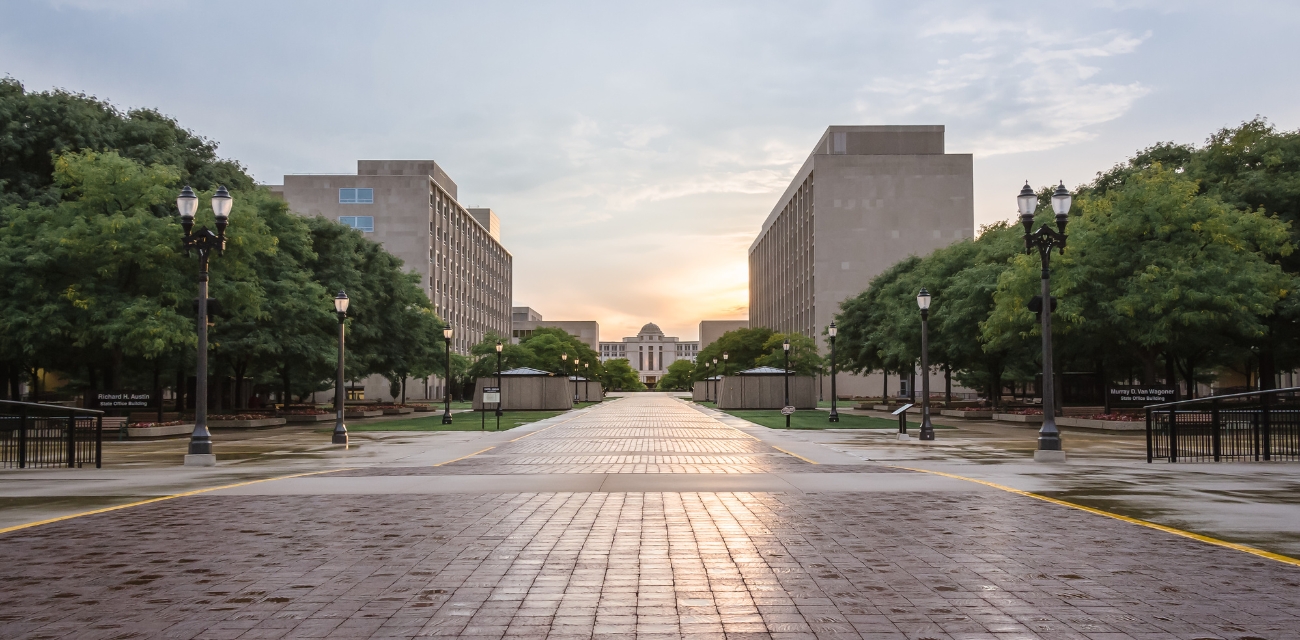 A brick path goes past state government offices and toward the Michigan Supreme Court