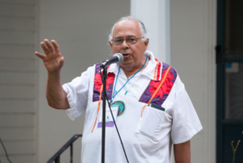 Frank Ettawageshik speaks to the crowd of the 2021 annual event in Dexter.