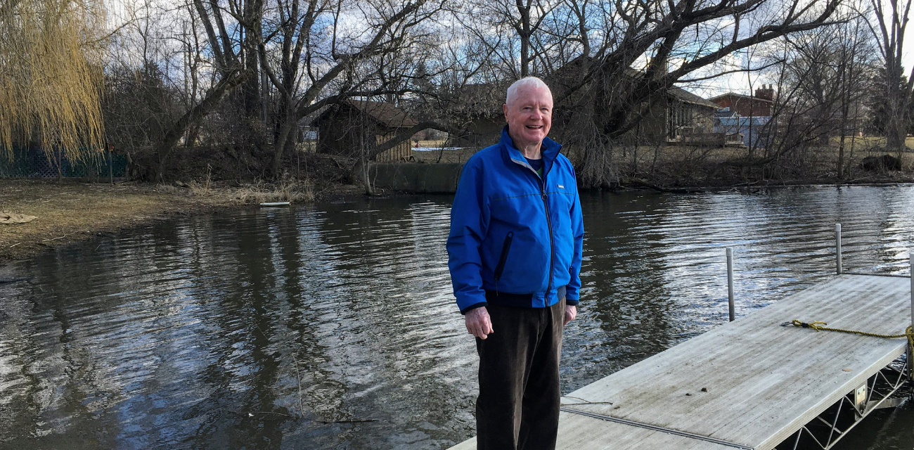 Gary Rayburn poses on a dock along the Pine River. (Photo courtesy of Healthy Pine River)