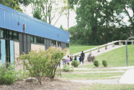 Kids walk away from an Ann Arbor Public School building (Photo courtesy of Midstory)