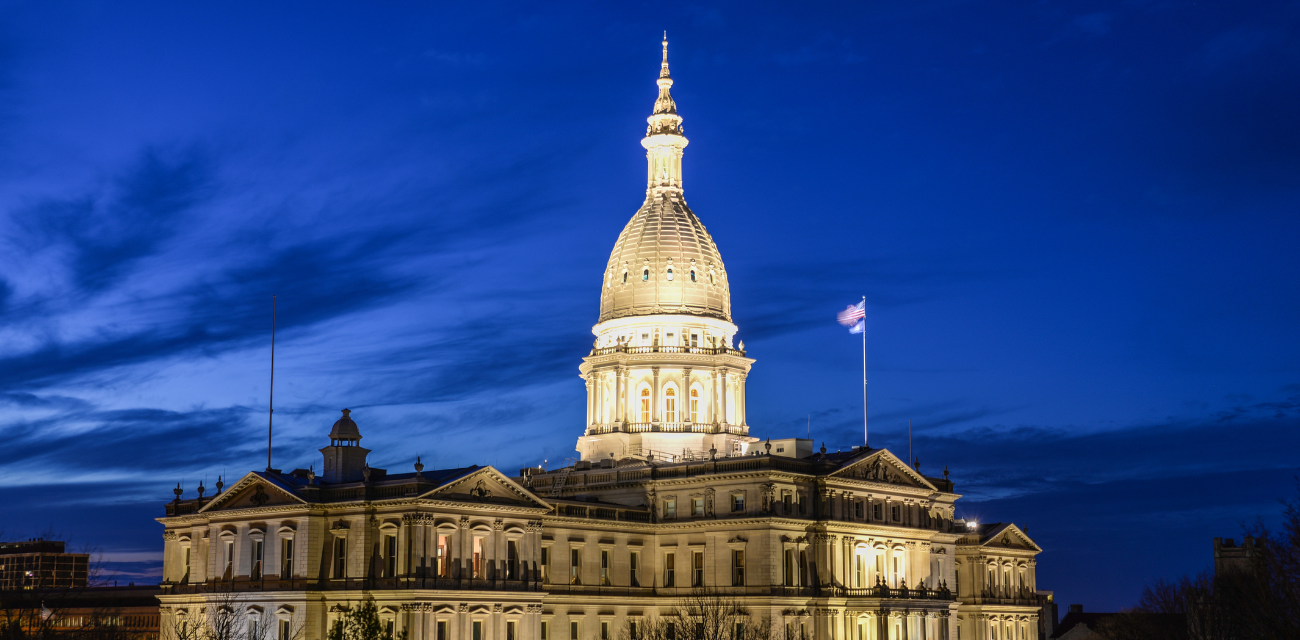 Michigan's Capitol building is lit up in the evening