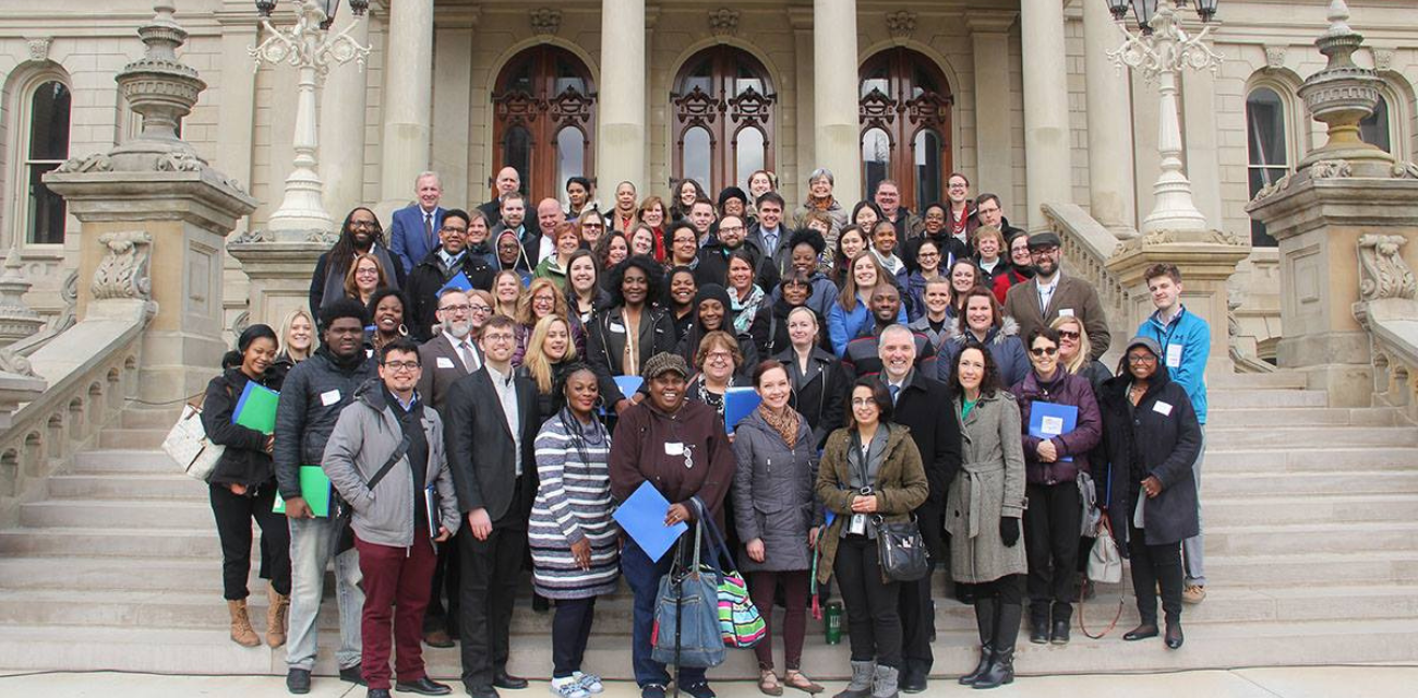 Participants of the 2018 Lead Education Day pose on the steps of the Michigan Capitol