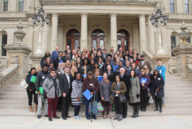 Participants of the 2018 Lead Education Day pose on the steps of the Michigan Capitol