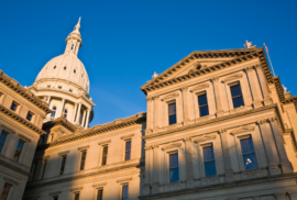 A side view of the state capitol in Lansing.