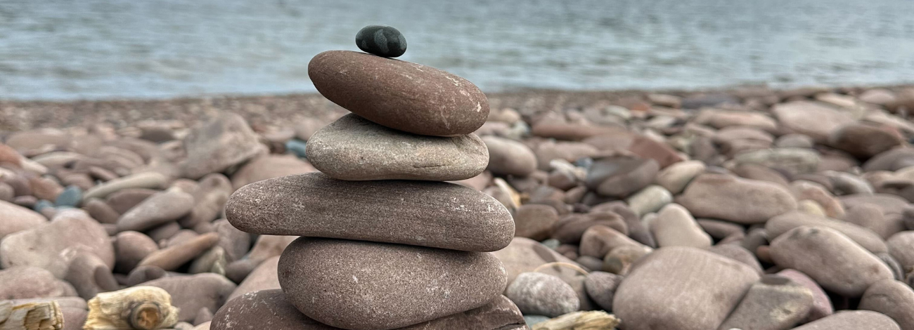 A stack of rocks along the Lake Superior shoreline.