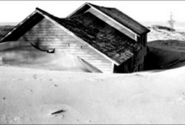 A house is covered by sand in the ghost town of Singapore in the early 1970s (Photo via Wikimedia Commons)