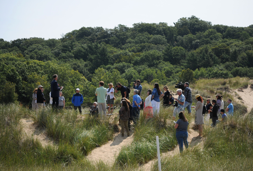 David Swan of the Saugatuck Dunes Coastal Alliance talks about the importance of dunes-development harmony at Oval Beach. (Photo by Nate Mathewson.)