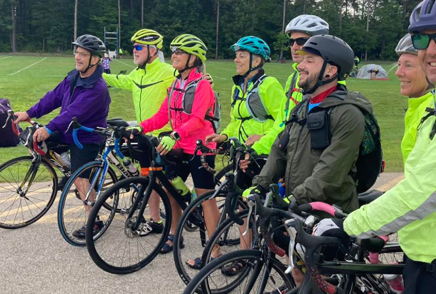 Bicyclists pose for a photo on their bikes. (Photo courtesy of the League of Michigan Bicyclists.)