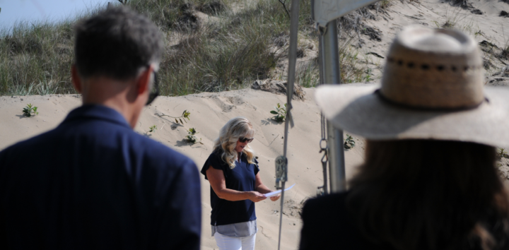 Saugatuck Mayor Lauren Stanton talks speaks about the importance of dunes for her community at Oval Beach (Photo by Nate Mathewson)