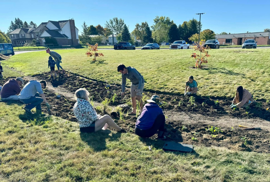 Volunteers plant native pollinator plants at Tonda Elementary School in Canton. (Photo courtesy of Plymouth Pollinators)