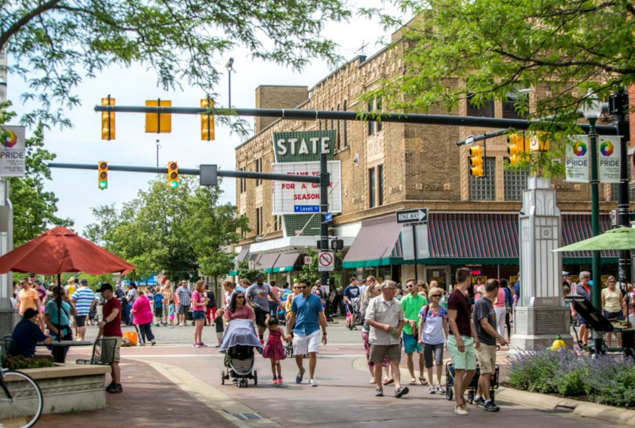People attend a community event in downtown Kalamazoo. (Photo courtesy of Kalamazoo Climate Crisis Coalition)