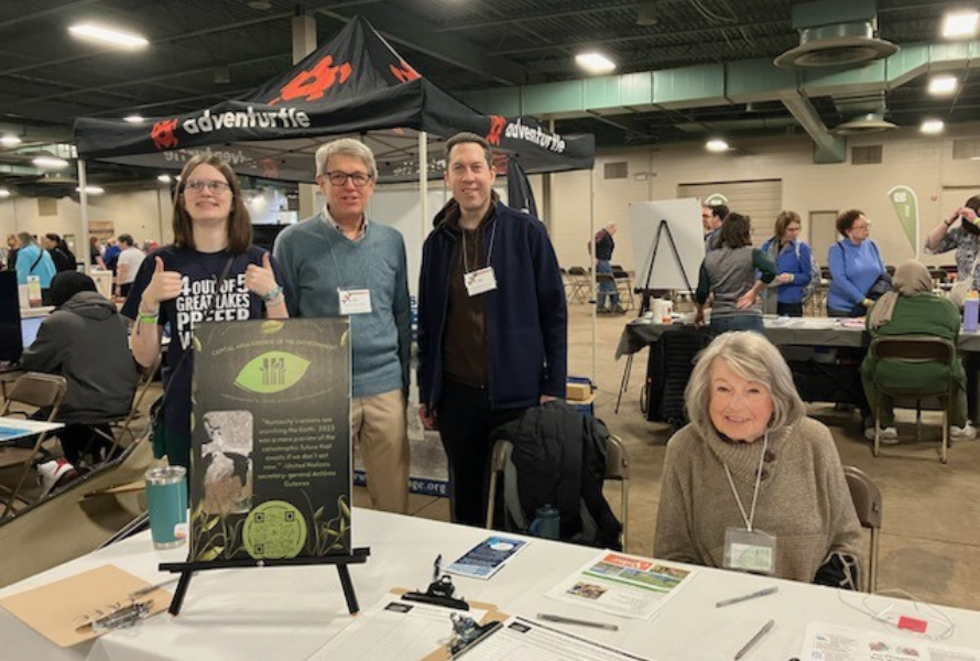 Members of Capital Area Friends of the Environment pose for a picture at an expo. (Photo courtesy of CAFE)