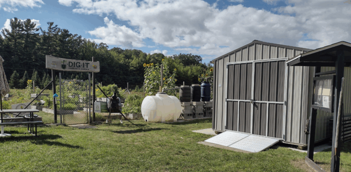 The front of the U Dig It Community Garden features rain barrels, informational signage, seating and a storage shed. (Photo courtesy of AFFEW.)